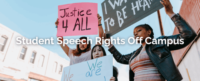 students protesting for students first amendment rights holding protest signs